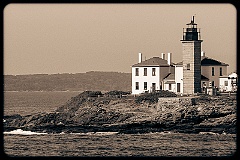 Beavertail Lighthouse Over Rock Formations- Sepia 2